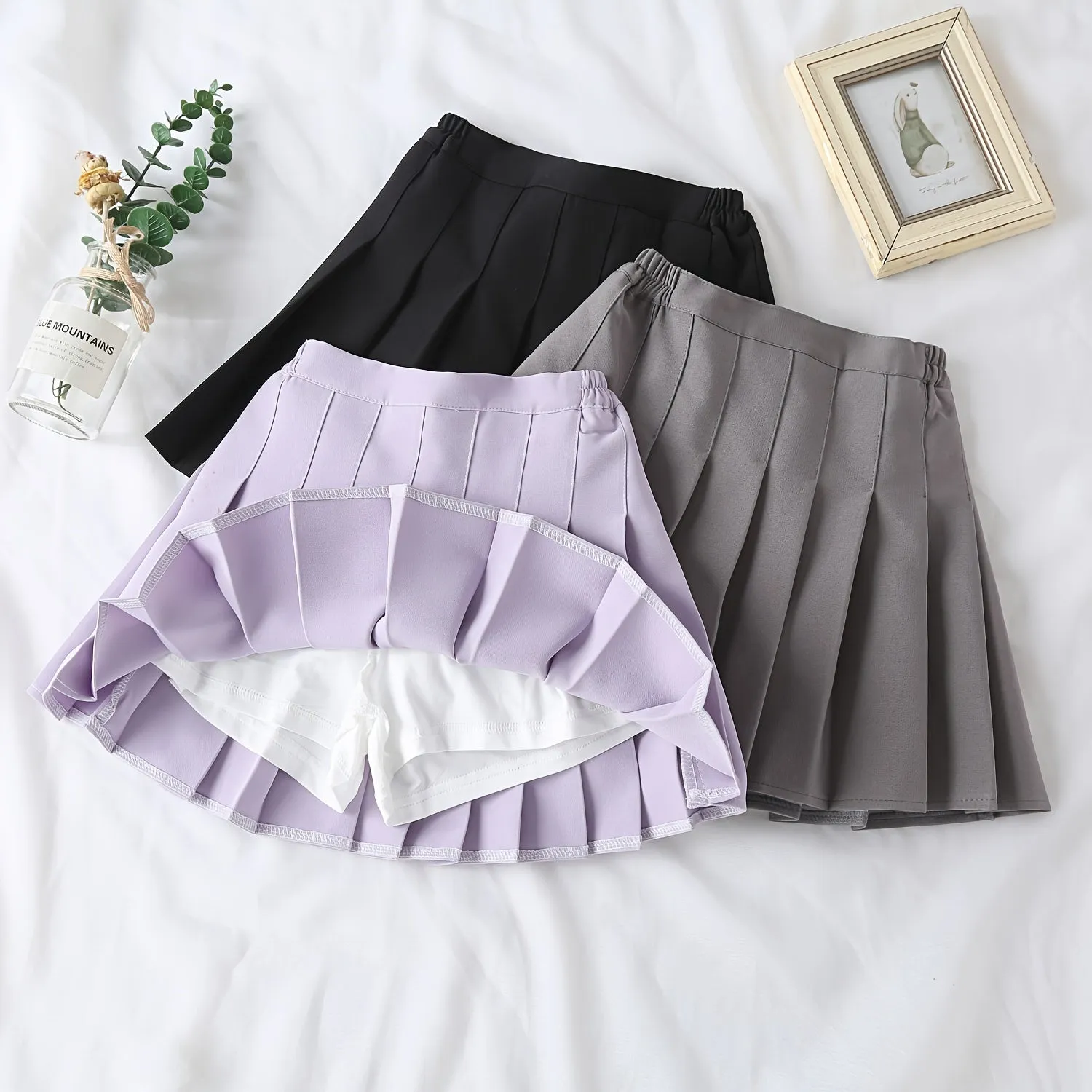 Chic Girls Black Pleated Mini Skirt with Integrated Safety Shorts - Summer School Uniform Essential for Parties