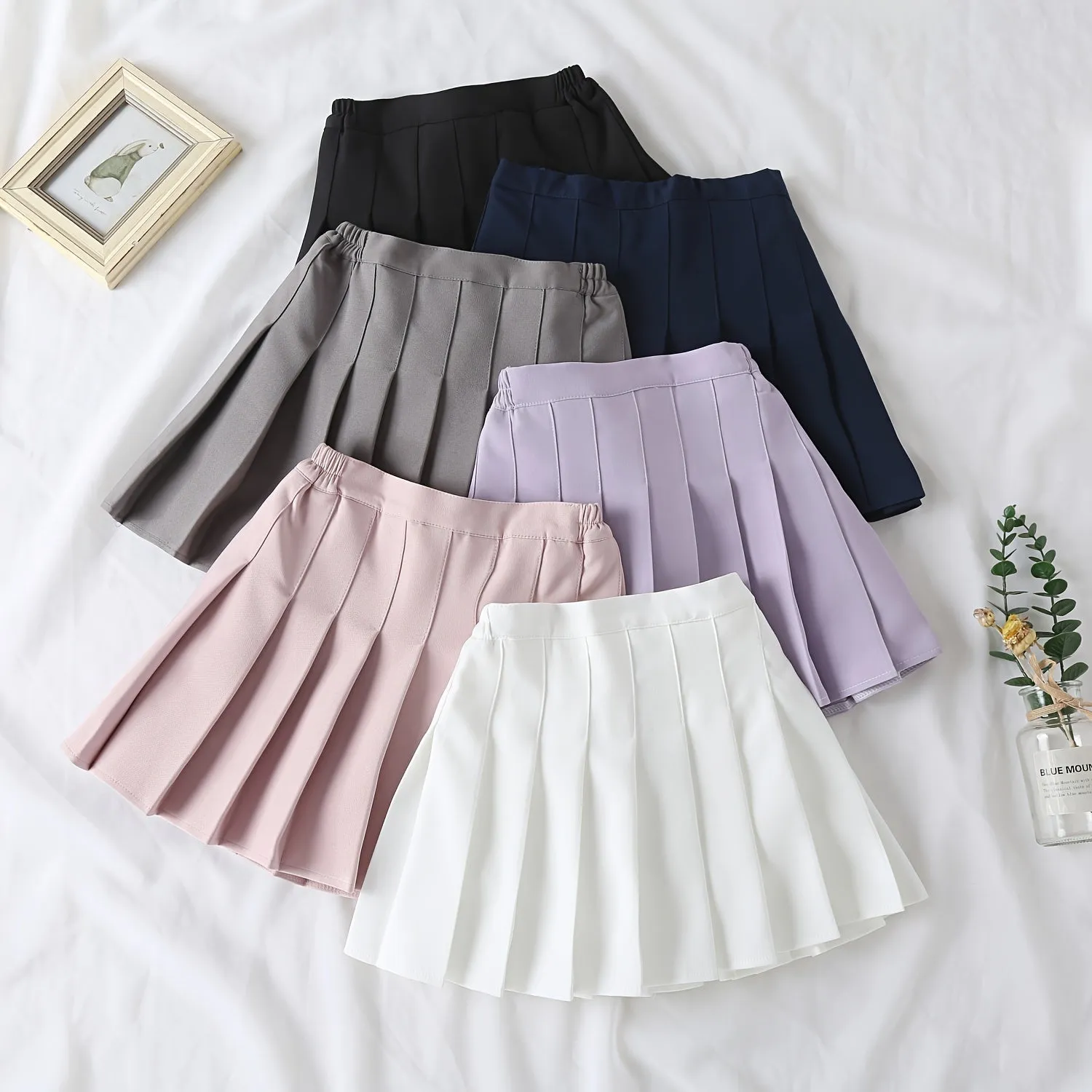 Chic Girls Black Pleated Mini Skirt with Integrated Safety Shorts - Summer School Uniform Essential for Parties