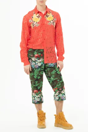 Cropped pants in printed military-inspired fabric